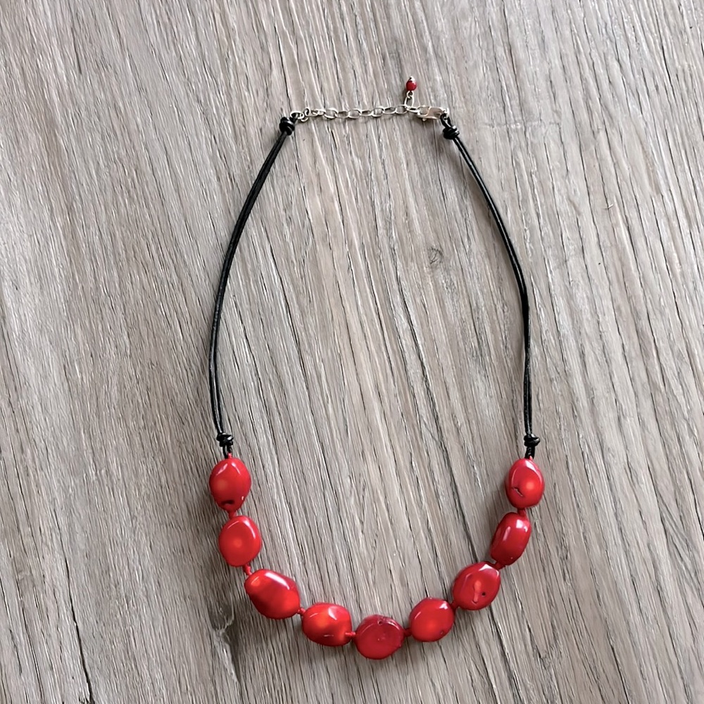Chunky red coral and black leather necklace